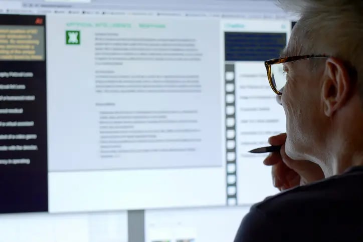 Man using ChatGPT on desktop computer