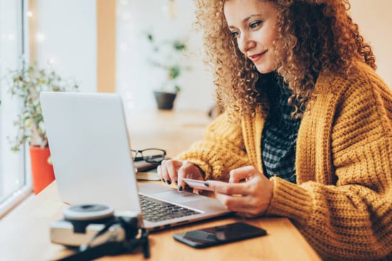 woman making an online purchase