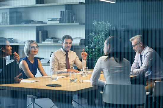 Senior executives having meeting in modern office