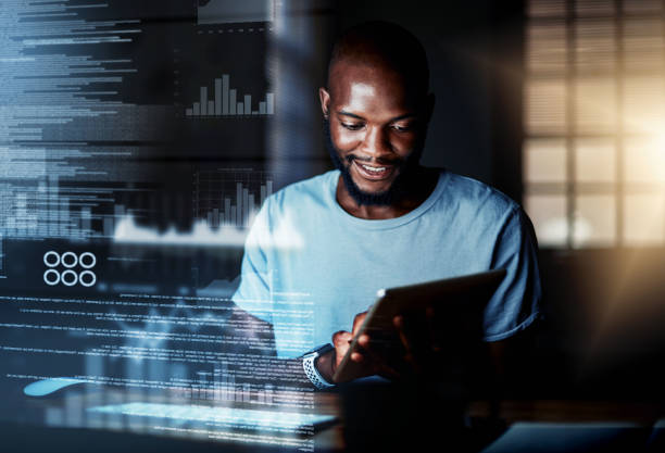 Man checking tablet in AI tech office Man checking tablet in AI tech office