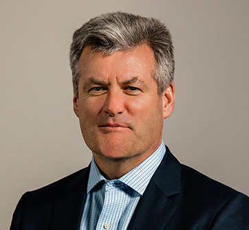 JOHN MADIGAN