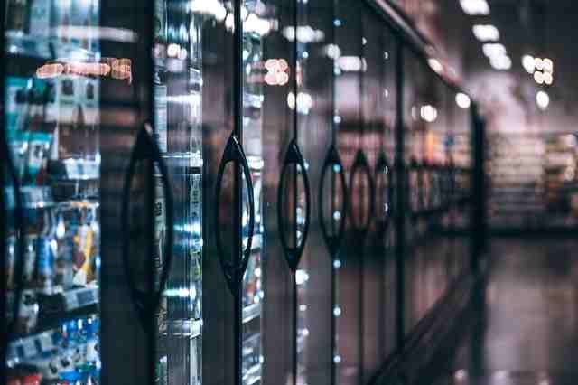 freezers in an aisle at the grocery shop
